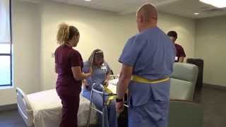 Physical Therapy Transfer Training  How To Transfer From Wheelchair To Bed [upl. by Kerrin146]